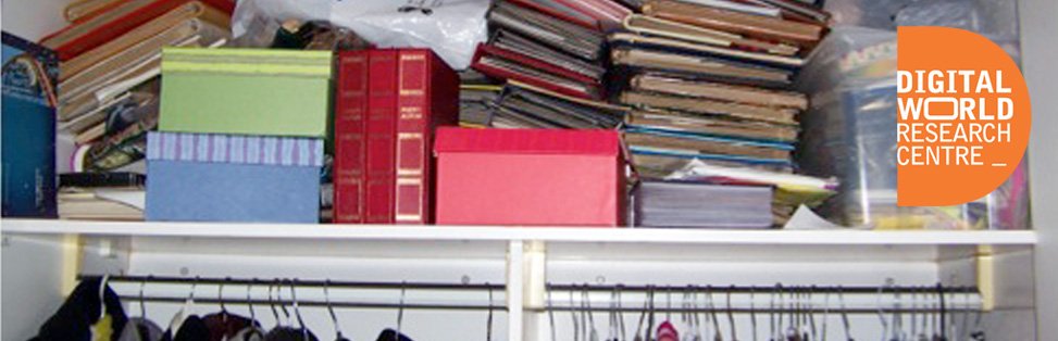 Rows of boxes and books on shelf