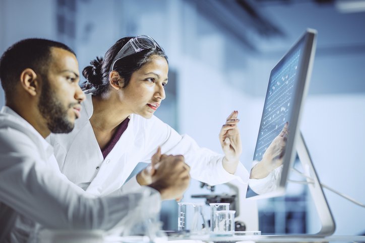 scientists-look-at-computer-GETTY