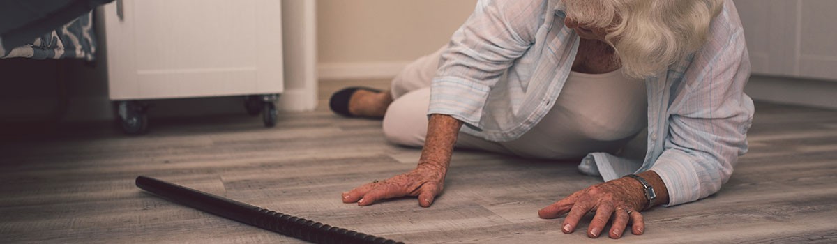 Elderly lady on floor