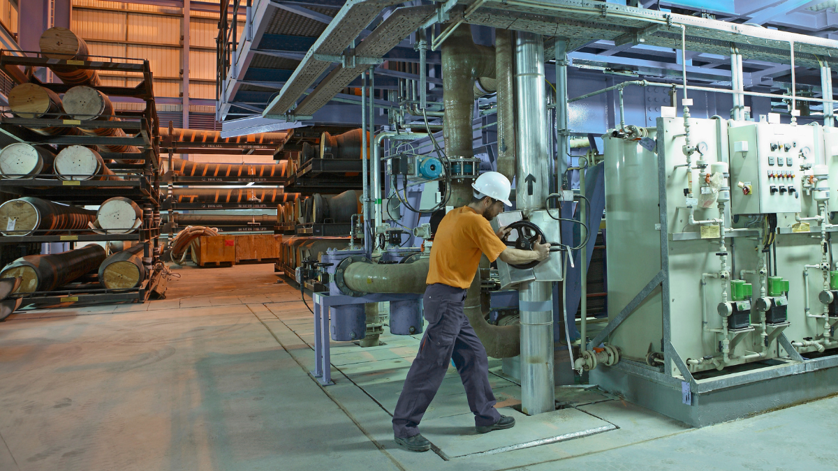 Worker operates a desalination plant