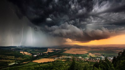 Storm clouds and lightening over the countryside