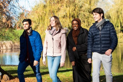 Surrey students walking by lake