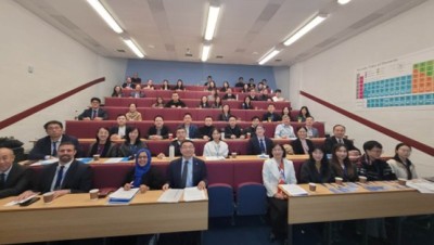 Delegates sitting in University of Surrey lecture theatre at 8th Sino-UK Forum, Nov 2024