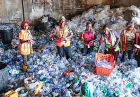 waste sorters sorting waste exported to developing world