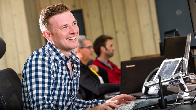 Staff member of Rocketdesk working at desk