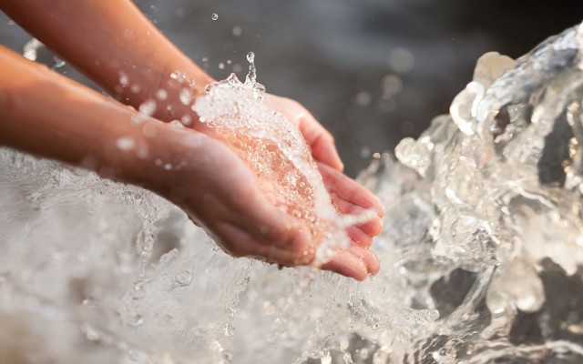 Hands in water