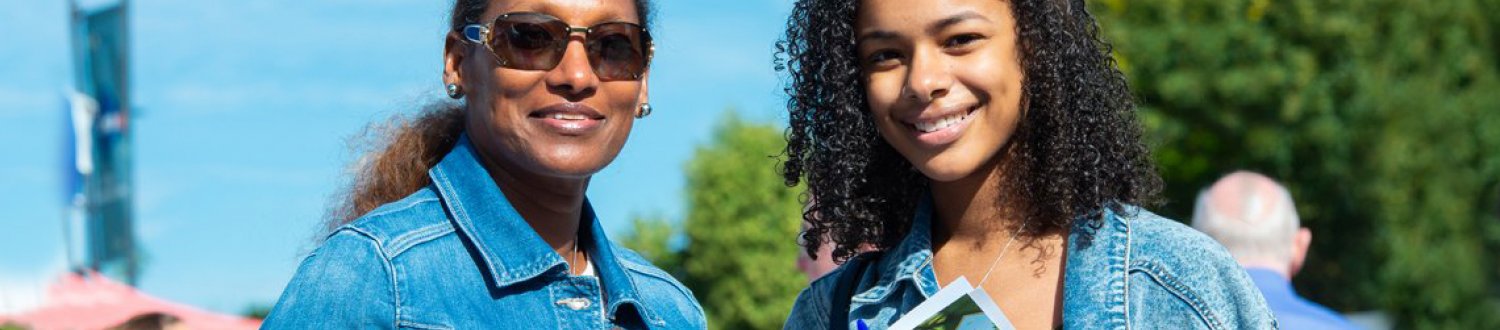 Two women smiling at camera