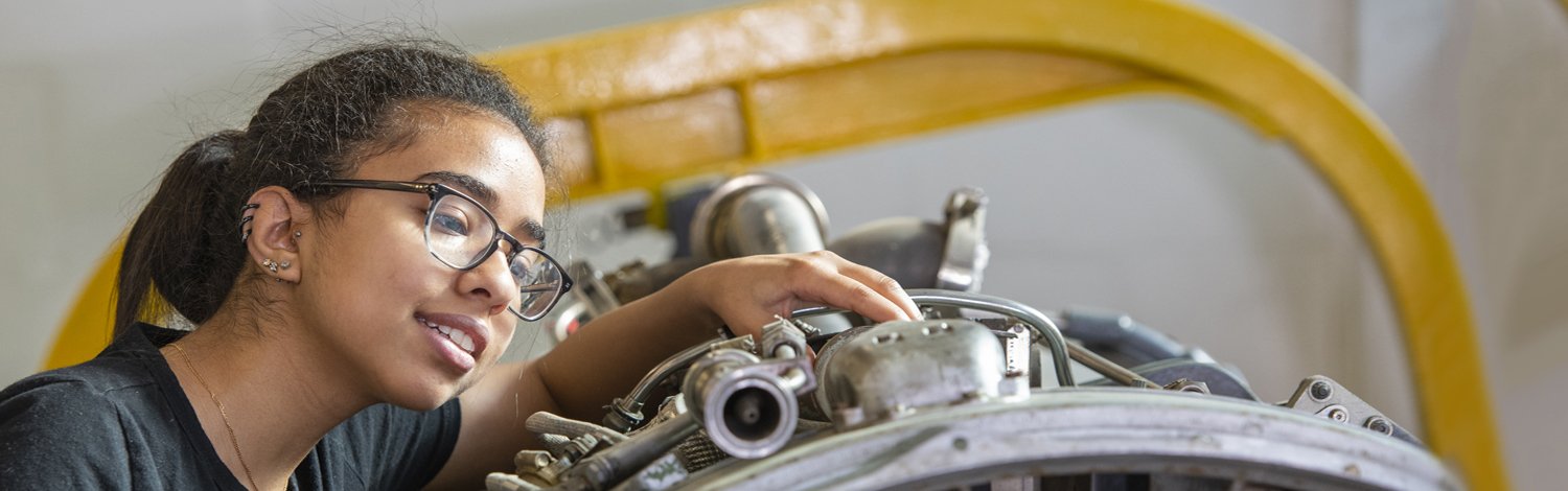 Woman using mechanical machine