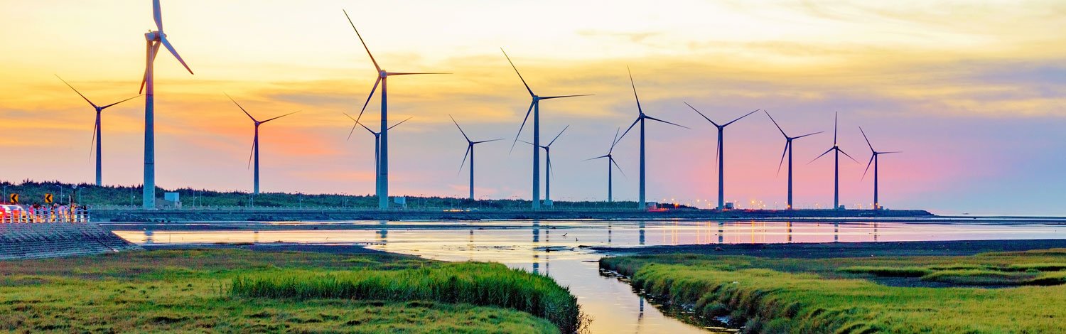 Wind turbines at sunset