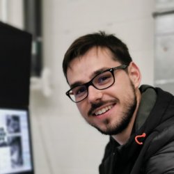 Mateus using the Focused Ion Beam microscope at Surrey's Advanced Technology Institute