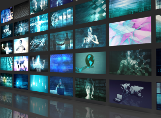 image of a wall of screens showing futuristic images