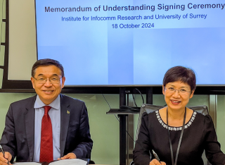 Max Lu and Sun Sumei signing MOU