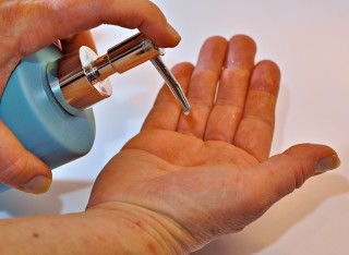 Soap pump onto hand