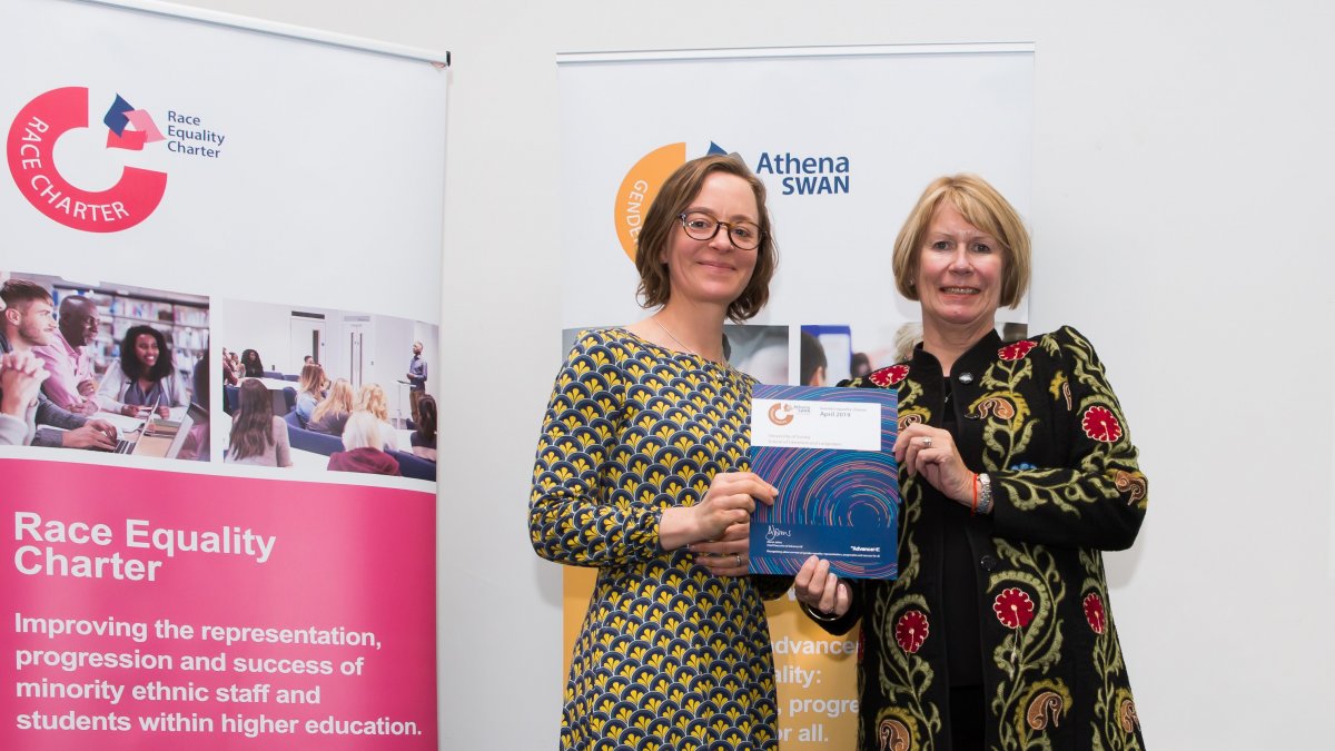 Dr. Bella Honess Roe collects Athena Swan Award