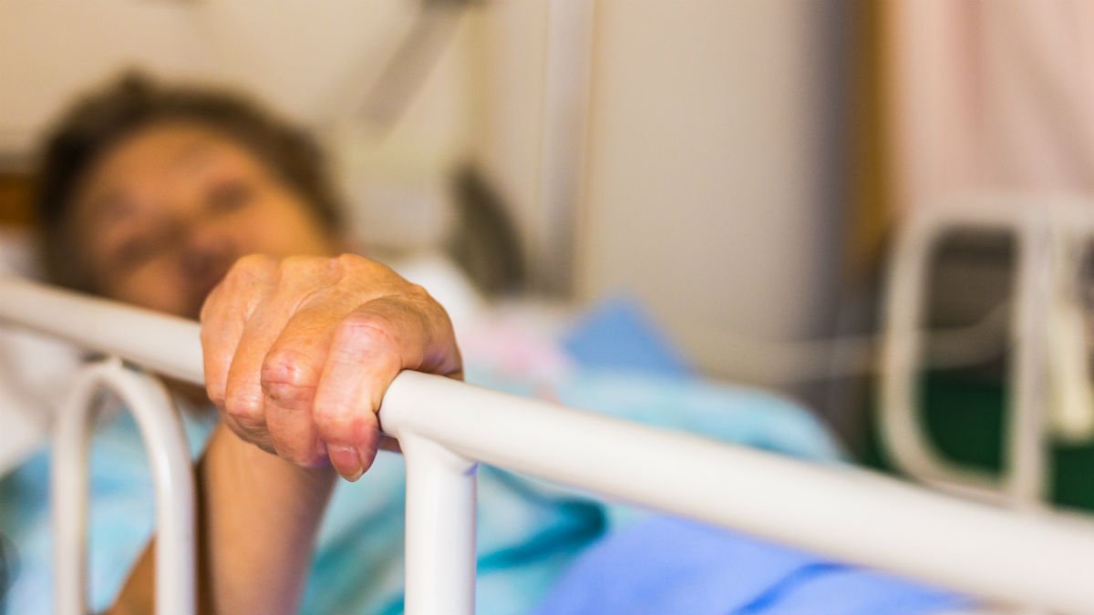 Patient lying in a hospital bed