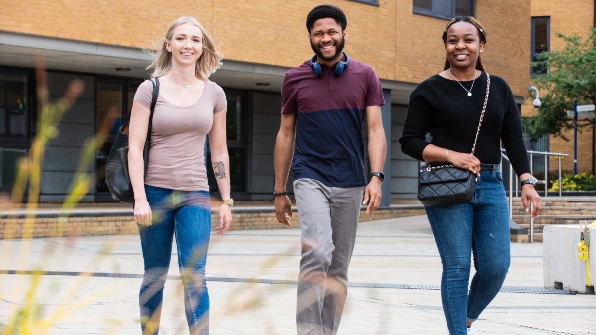 A group of students walking on campus