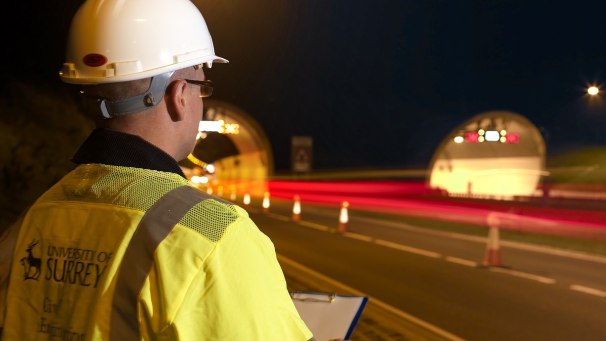 Surrey civil engineering student looking at entrance to Hindhead Tunnel