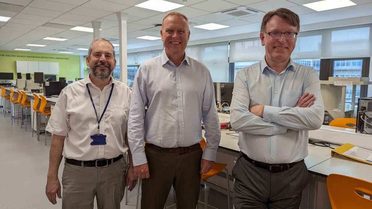 Paul Smith, Peter Thompson and Bob Nichol stand in the University of Surrey's Radiation Lab