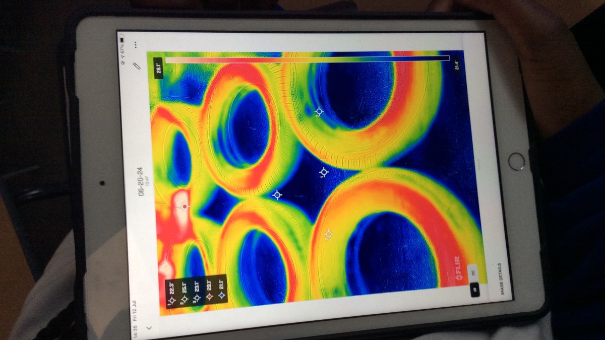 Tablet showing thermal imaging of tyres